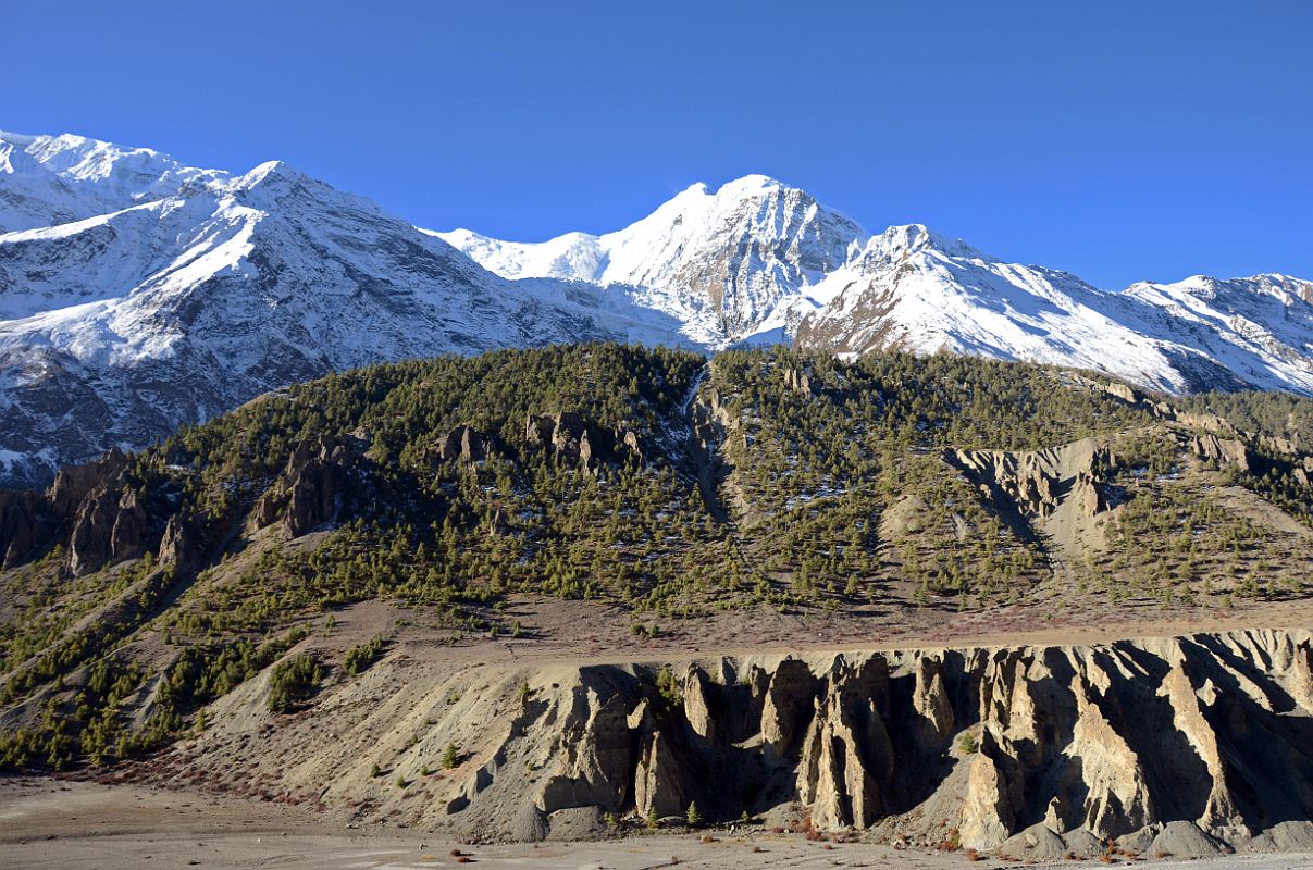 01 Ridge To Annapurna III and Gangapurna Early Morning Just After leaving Manang On Trek To Tilicho Tal Lake 